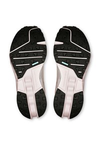Suola in gomma nera con motivi texture, intersuola rosa e un design geometrico liscio. Presenta scanalature flessibili per una maggiore aderenza.