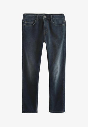 Jean en denim bleu foncé avec une coupe slim, un design cinq poches et un léger délavage. Dispose d'une fermeture à bouton et à zip à l'avant.