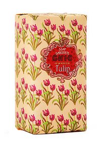 Wrapped soap bar in a rectangular shape, featuring a beige background adorned with pink tulips and green stems. Red label with "Chic Tulip."