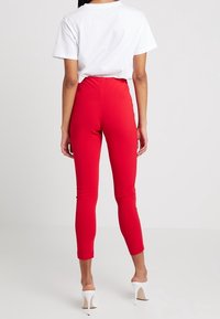 Missguided Leggings - Byxor - red