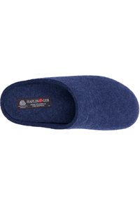 Dark blue wool slipper with a closed back, rounded toe, and a textured surface. Branding label visible inside. Made of pure new wool.