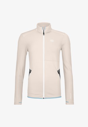 Beige full-zip jacket with high collar, light blue trim, dark gray zippered side pockets, and a white logo on the chest.