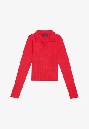 Haut long à manches rouges côtelé avec un col et une patte de boutonnage, présentant une coupe ajustée et une texture lisse. Étiquette visible à l'intérieur du col.