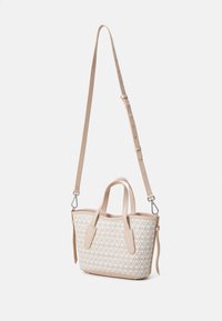Small handbag in light beige, featuring a textured floral pattern, dual handles, and a detachable adjustable strap. Smooth finish.