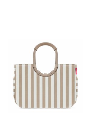 Beige and white vertical striped tote bag with rounded handles and a small red brand tag on the side against a white background.