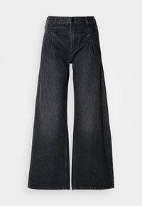 Platėjantys džinsai - denim black