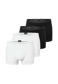 Fire mænds boxershorts i sort og hvidt, mærket "Schiesser" på elastikken, arrangeret i to rækker på en hvid baggrund.