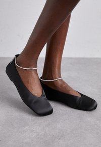 REELO - Babies - jet black