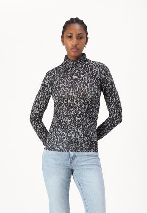 Langärmeliger Rollkragenpullover in Schwarz und Grau mit abstraktem Muster, aus elastischem Material mit strukturiertem Design und figurbetonter Silhouette.