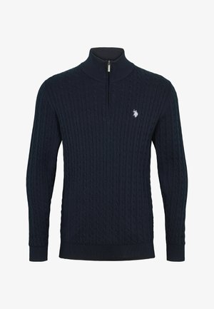 Pulover tamnoplave boje, pleten s visokim ovratnikom i patentnim zatvaračem, s uzorkom pletenice i rebrastim manžetama i rubom. Mali izvezeni logo.