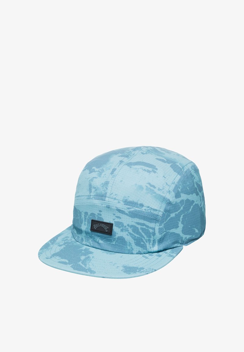 Blue cap made of textured fabric with a water-inspired pattern, featuring a black logo patch on the front. Sports a flat brim design.