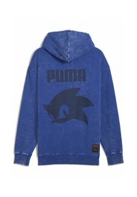Blå hoodie i bomullsmix, med en stor svart "PUMA"-logotyp och en Sonic the Hedgehog-design på baksidan. Ribbad mudd och nederkant.