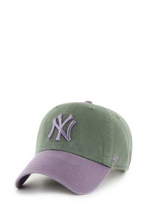Green cotton cap with a purple curved brim, featuring an embroidered NY logo in purple on the front. Adjustable strap at the back.