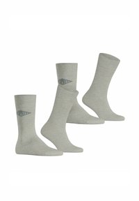 Graue Baumwollsocken mit geripptem Textur, unterschiedlicher Höhe und einem kleinen Logo auf einer Socke. Jedes Paar hat eine glatte Oberfläche und ist in Knöchel- bis Crew-Länge erhältlich.