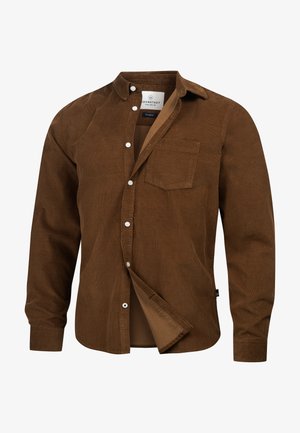 Braunes Cordhemd mit Button-Down-Kragen, langen Ärmeln, einer einzelnen Brusttasche und weißen Knöpfen. Der Stoff hat eine strukturierte, gerippte Optik.