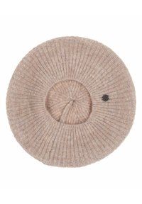 Round beige knit beret with a ribbed texture and a twisted top section. Features a small black metal logo accent on the side.