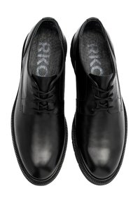 Scarpe eleganti in pelle nera con una texture liscia e lucida, caratterizzate da un design classico con lacci e una soletta imbottita. Suola in gomma per una buona aderenza.