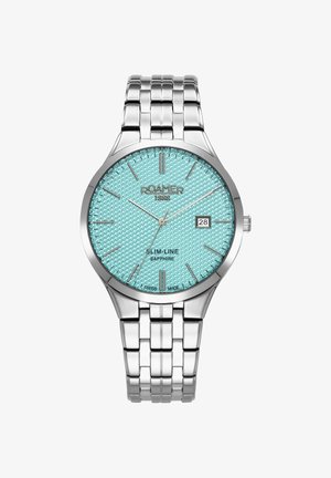Orologio da polso in acciaio con quadrante blu chiaro texture, indici delle ore argentati e display della data. Dotato di bracciale in metallo e cristallo di zaffiro.