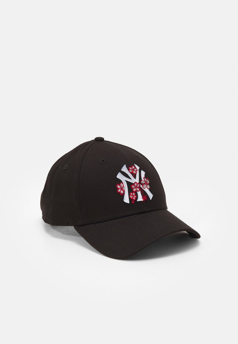 Black baseball cap featuring a white "NY" logo with red floral accents. Made of fabric with a slightly structured visor and adjustable back.