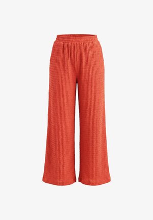 Pantaloni a gamba larga in tessuto arancione strutturato con una fascia elastica in vita, caratterizzati da una vestibilità comoda e rilassata.
