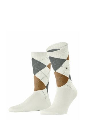 Chaussettes blanches avec un motif argyle en brun, gris et crème, avec une texture côtelée et des détails renforcés au niveau des orteils et du talon.