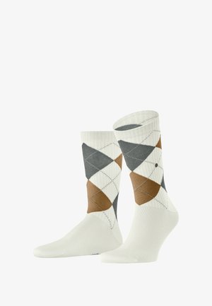 Białe skarpetki z wzorem argyle w brązowym, szarym i kremowym kolorze, z prążkowaną fakturą oraz wzmocnionymi detalami na palcach i piętach.