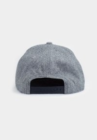Gray felt cap with a textured finish, flat brim, and black adjustable strap at the back featuring multiple snap closures.