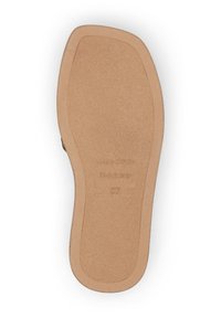 Brown rubber shoe sole featuring a textured finish, rounded toe, and slight heel with embossed sizing details and branding at the base.