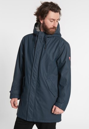 Navy waterproof coat featuring a hood, front buttons, and side pockets. Made from a smooth material with a soft lining.