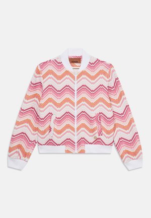 Lightweight bomber jacket with a zigzag pattern in pink, orange, and white. Features a front zipper and ribbed white cuffs and hem.