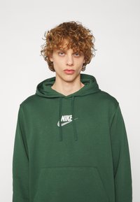 Nike Sportswear Kapuzenpullover - fir