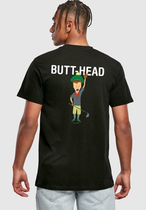 T-shirt noir avec un personnage de dessin animé tenant un club de golf, avec "BUTT-HEAD" imprimé au-dessus en grandes lettres blanches.