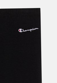 Champion ICONS UNISEX - Pantalones deportivos - black