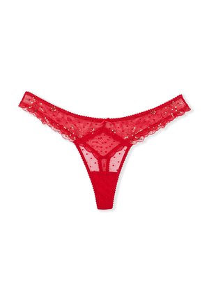 String rosso in pizzo con texture a pois, bordi scallopati e paillettes lungo la vita. Presenta un design minimal sul retro.