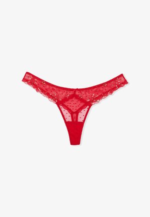 Rote Spitzenunterhose mit Pünktchendesign, gewellten Kanten und Pailletten entlang des Bunds. Besitzt ein minimalistisches Rückenddesign.