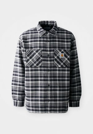 Schwarz-weiß kariertes Flanellhemd mit langen Ärmeln, zwei vorderen Taschen und einem quadratischen Logopatch auf der rechten Tasche. Mit Knopfschluss.