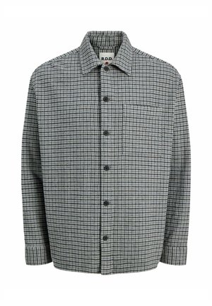 Surchemise grise à carreaux et à boutons, avec un col pointu, des manches longues et une poche poitrine, sur fond blanc.