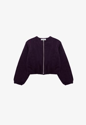 Lila Cord-Jacke in cropped Form mit rundem Ausschnitt, langen Puffärmlen und einem zentralen Reißverschluss. Strukturiertes Gewebe mit vertikalen Rillen.
