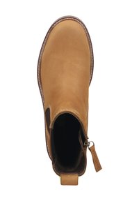Botín de cuero marrón con paneles elásticos en los lados, puntera redonda y costuras en contraste. Cuenta con una cremallera y una pestaña para facilitar el calzado.