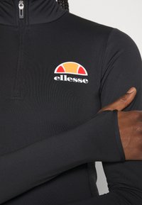 Ellesse SOFIRA 1/4 ZIP - Ilgarankovis viršutinės dalies drabužis - black