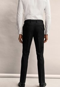 Next ATHLETIC FIT MOTIONFLEX STRETCH - SLIM FIT - Öltönynadrág - black