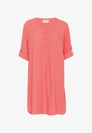 Korallefarbene, kurzärmelige Tunika aus leichtem Stoff mit Henley-Ausschnitt und Knöpfen, umgeschlagenen Ärmeln und einem lockeren Schnitt mit seitlichen Schlitzen.