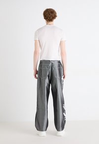 Jaded London CURRENCY SHINY COLOSSUS - Jean large - silver