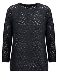 Pull noir en maille à manches longues avec motif géométrique en zigzag et triangles et encolure ronde.