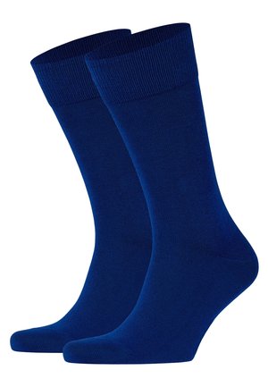 Dunkelblaue Baumwollsocken mit gerippten Bündchen, einer glatten Textur und verstärkten Fersen- und Zehenbereichen für zusätzliche Haltbarkeit.