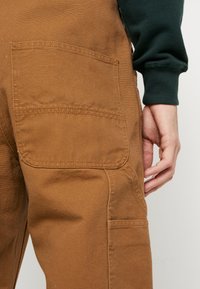 Carhartt WIP BIB OVERALL - Denim Dungarees - hamilton brown rinsed