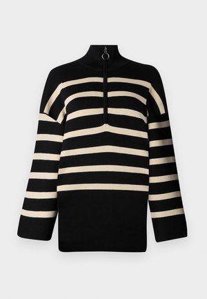 Black and cream striped pullover with a high neck and a quarter zip. Knit texture with wide sleeves and a relaxed fit.