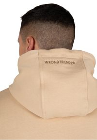 Wrong Friends NAMEN  - Jersey con capucha - beige