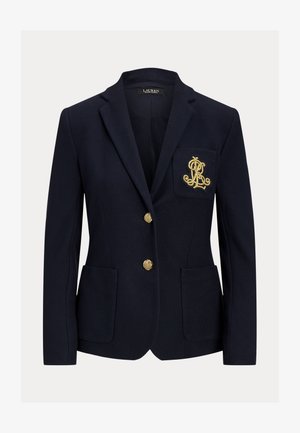 Marineblazer med to gyldne knapper, frontlommer med lapper og en brystlomme med et broderet monogram i guld.