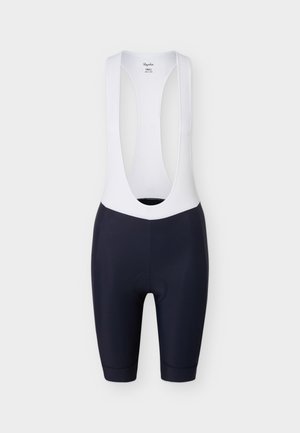 Cuissard à bretelles pour homme avec short rembourré noir et bretelles blanches, taille petit, présenté à plat sur fond blanc.